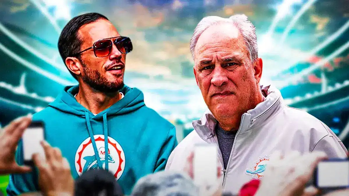 Miami Dolphins head coach Mike McDaniel next to Vic Fangio in front of Hard Rock Stadium.