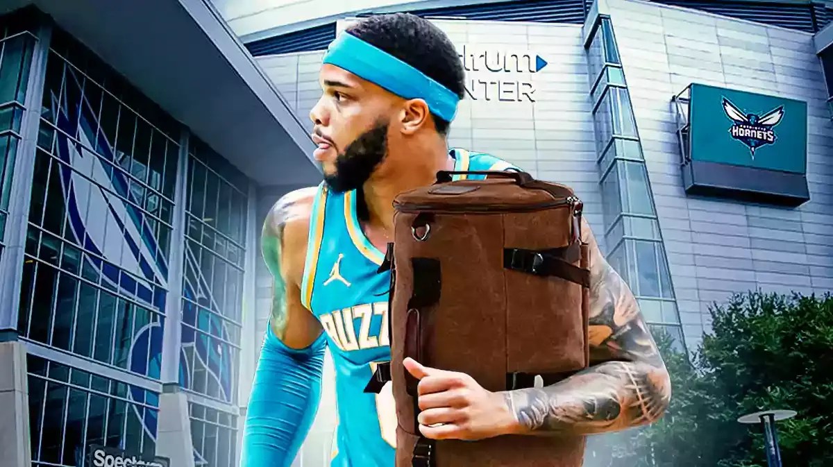 Hornet Miles Bridges with a suitcase outside of Spectrum Center