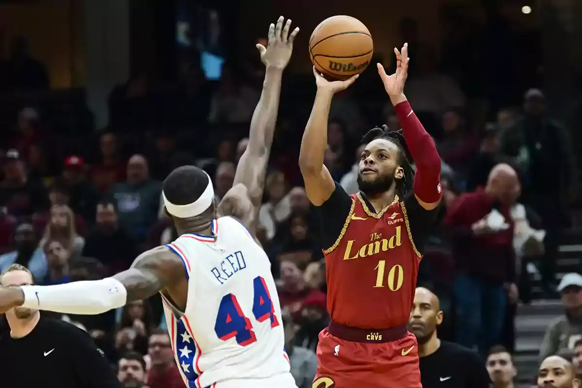 Cleveland Cavaliers guard Darius Garland (10) shoots over the defense of Philadelphia 76ers forward Paul Reed (44) during the second half at Rocket Mortgage FieldHouse.
