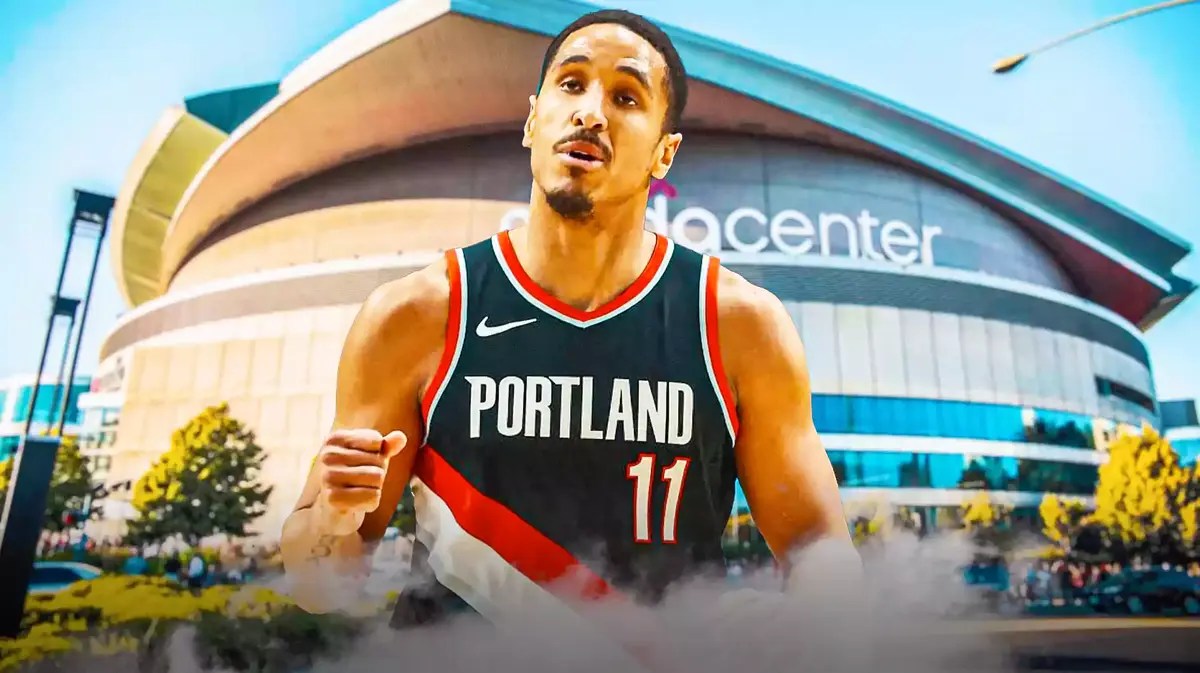 Blazers guard Malcolm Brogdon in front of Moda Center