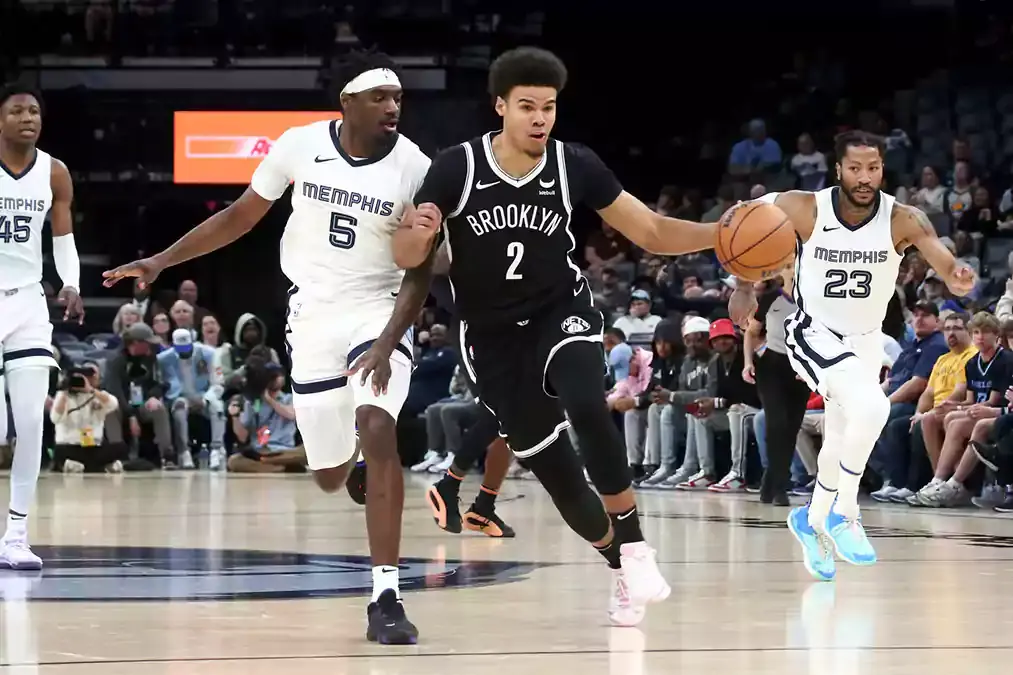 Brooklyn Nets forward Cameron Johnson (2) drives up the court after stealing the ball from Memphis Grizzlies guard Vince Williams Jr. (5) during the second half at FedExForum.