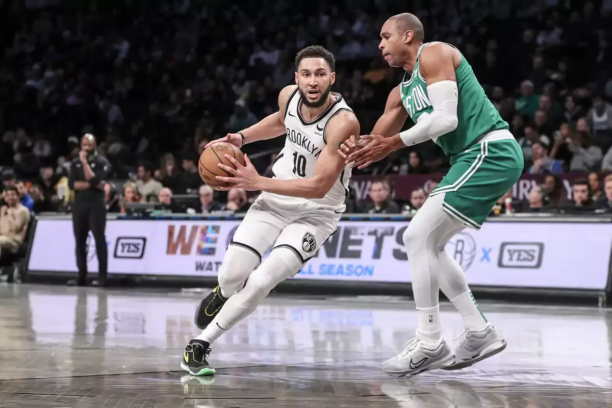 Brooklyn Nets guard Ben Simmons (10) drives past Boston Celtics center Al Horford (42) in the third quarter at Barclays Center