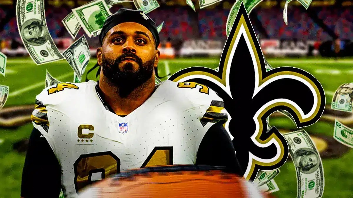 Cameron Jordan with money all around next to Saints logo