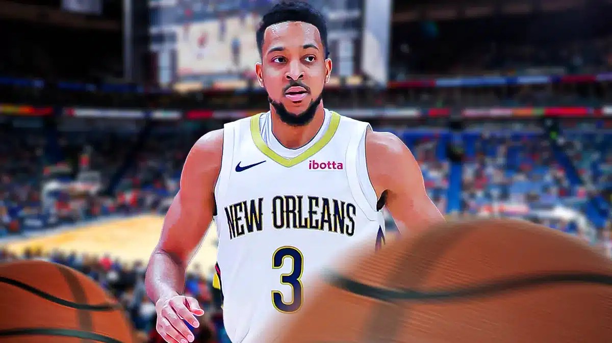 CJ McCollum with the Pelicans arena in the background, injury