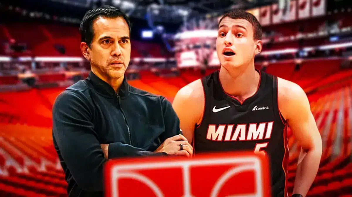 Miami Heat head coach Erik Spoelstra next to star Nikola Jovic in front of the Kaseya Center.