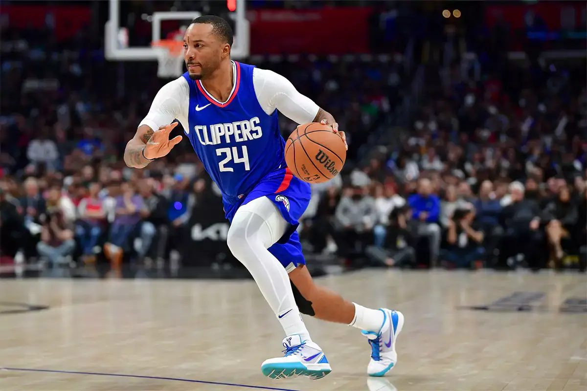 Los Angeles Clippers guard Norman Powell (24) moves the ball against the Minnesota Timberwolves during the second half at Crypto.com Arena.