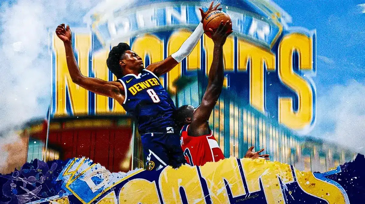 Denver Nuggets second-year wing Peyton Watson rising up for a block