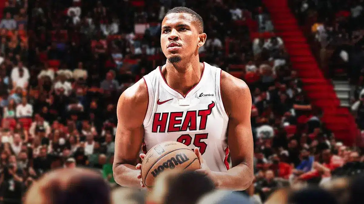 Orlando Robinson with the Heat arena in the background