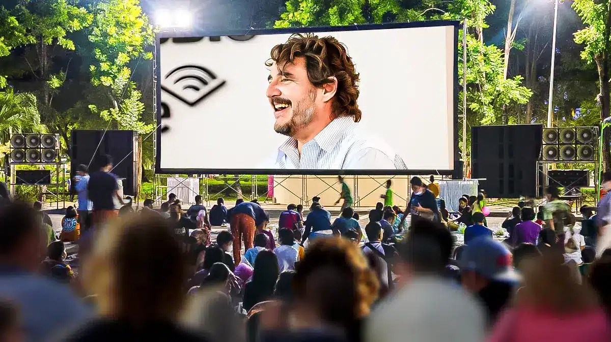 Pedro Pascal on a movie screen to a full audience