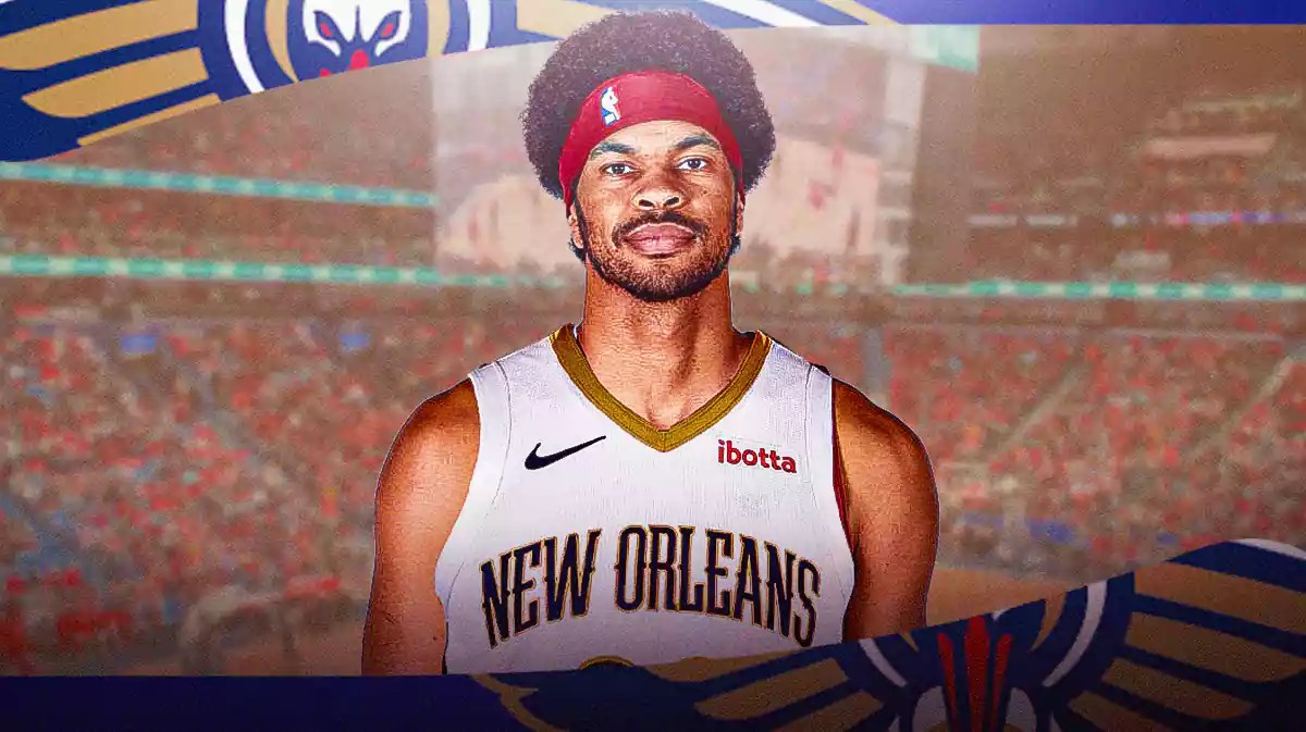 Jarrett Allen in a Pelicans jersey with the Pelicans arena in the background