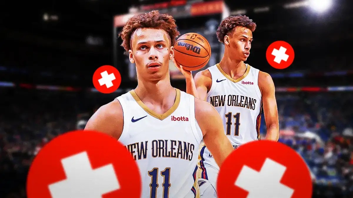 Pelicans' Dyson Daniels with a medical red cross next to him