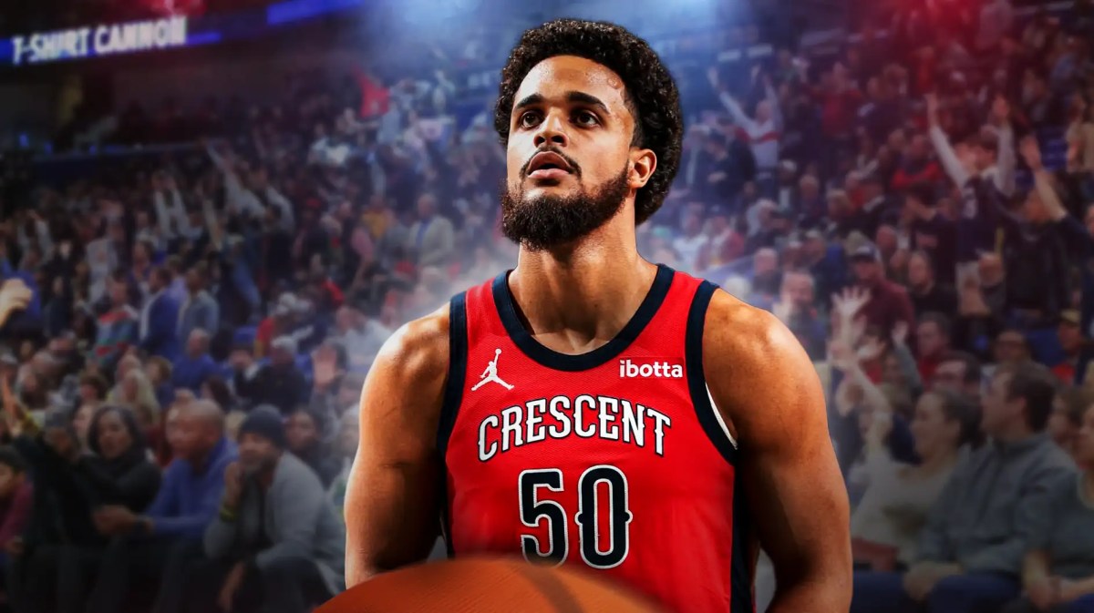 Jeremiah Robinson-Earl in his Pelicans jersey with the Pelicans arena in the background
