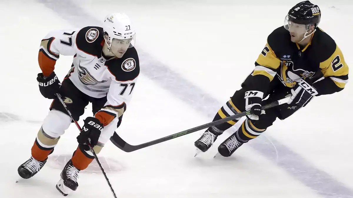 Anaheim Ducks right wing Frank Vatrano (77) skates with the puck against Pittsburgh Penguins defenseman Chad Ruhwedel (2) during the second period at PPG Paints Arena.