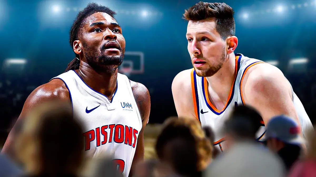 Suns Drew Eubanks stands next to Pistons' Isaiah Stewart