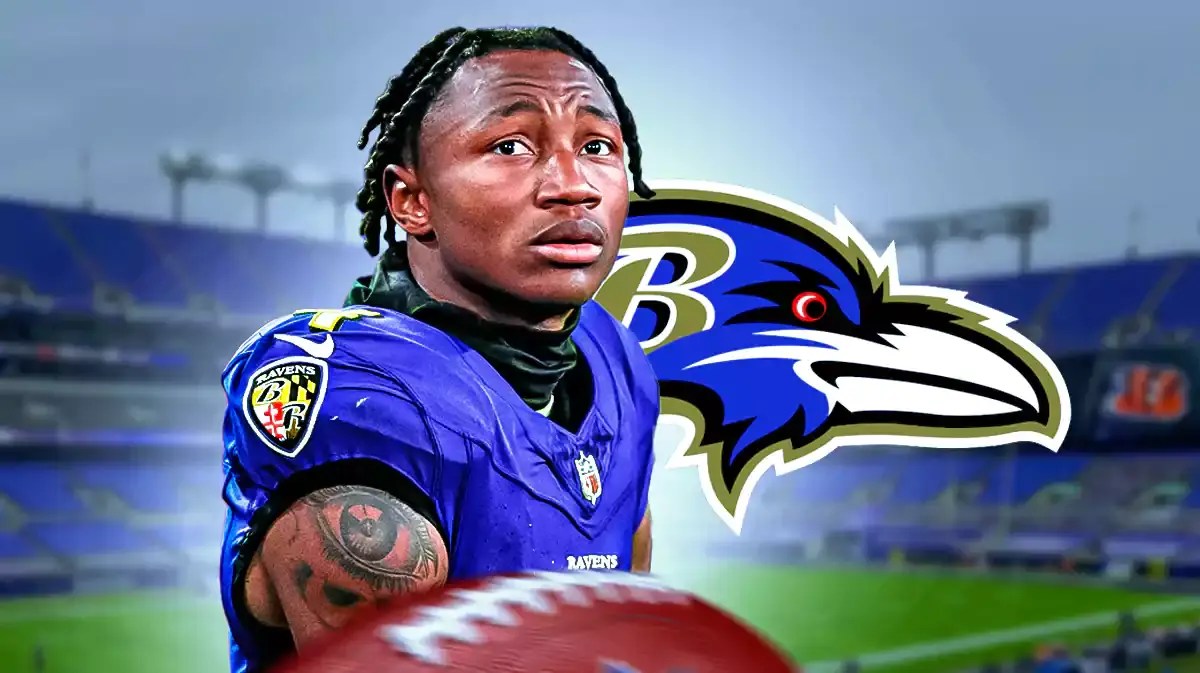 Zay Flowers in front of a Ravens logo at M&T Bank Stadium