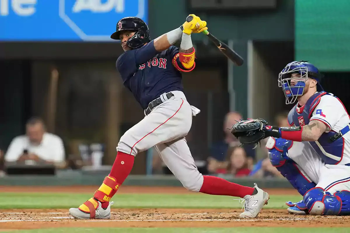 Boston Red Sox shortstop Ceddanne Rafaela (43) follows through on his single against the Texas Rangers during the second inning at Globe Life Field.