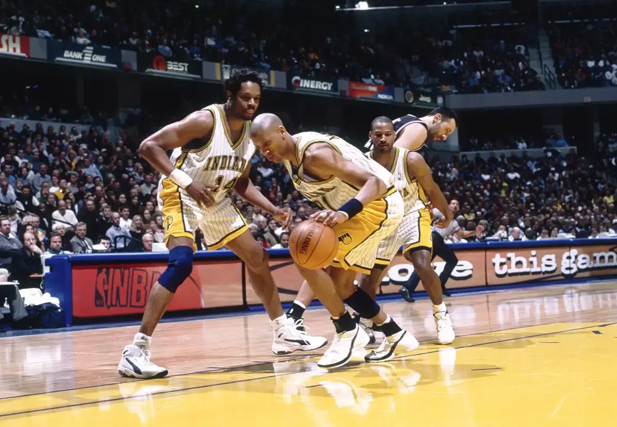 Reggie Miller securing the basketball as a member of the Indiana Pacers