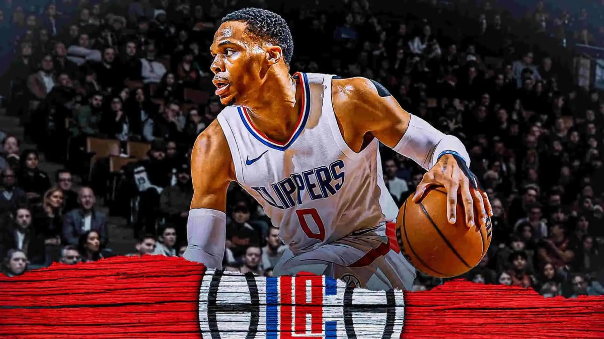 Russell Westbrook looking hyped with the Clippers arena in the background