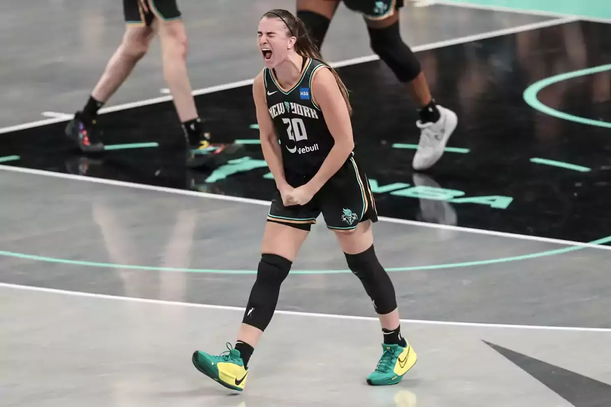 Sabrina Ionescu showing excitement on the New York Liberty.