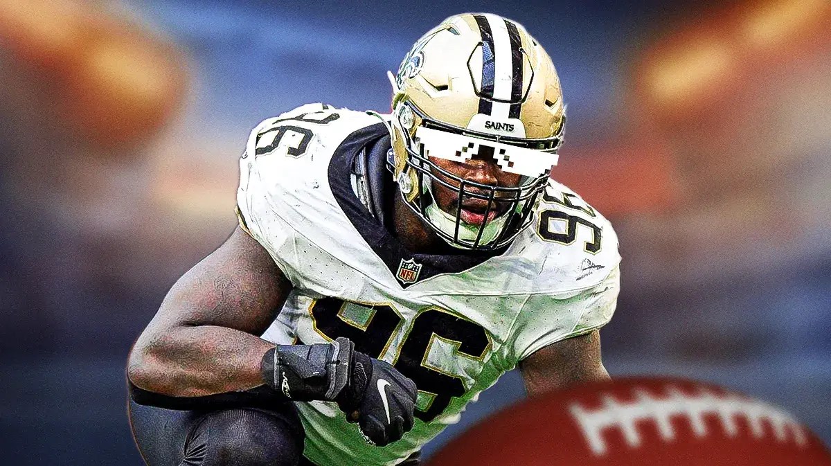 Carl Granderson (Saints) action shot withdeal with it shades