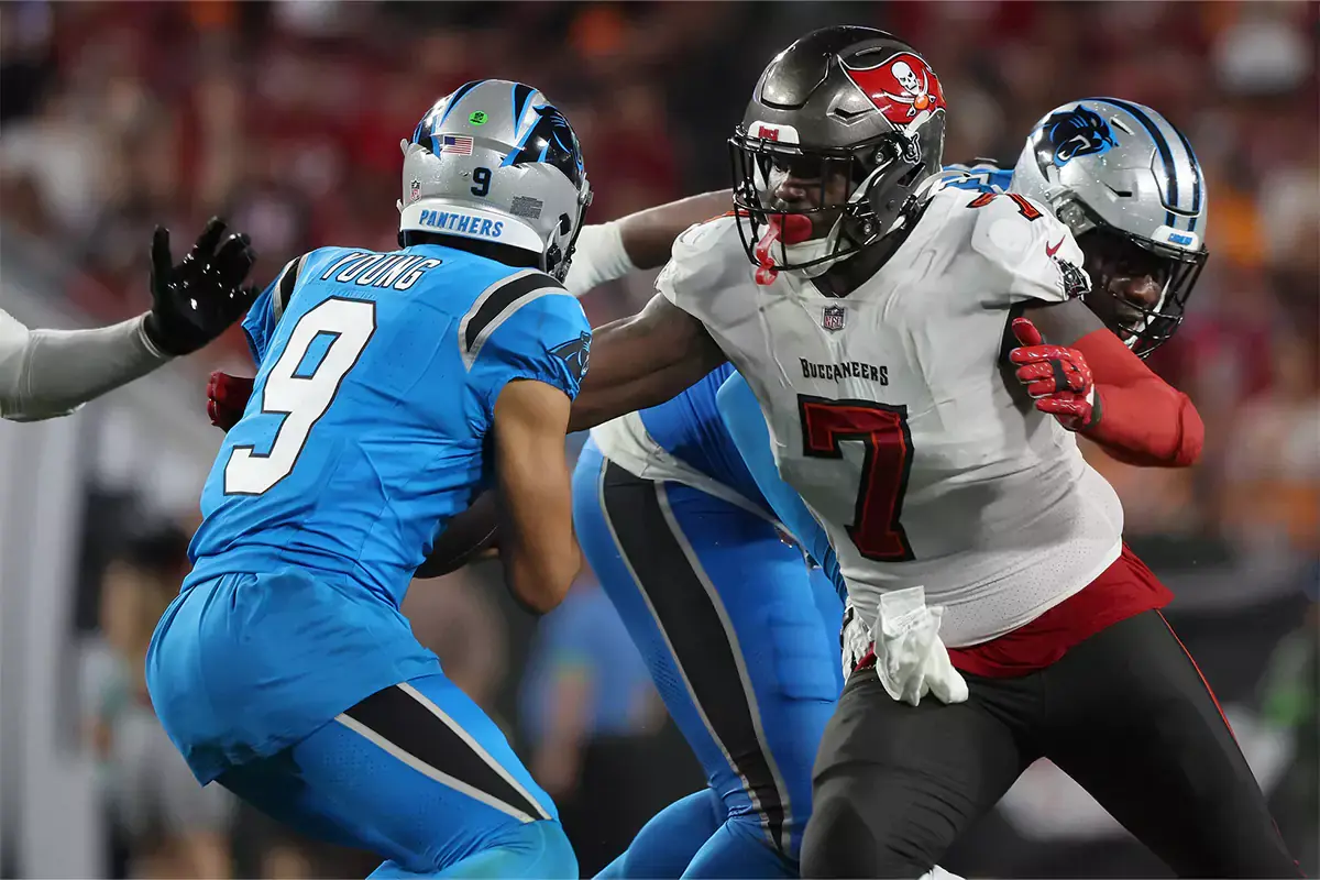 Tampa Bay Buccaneers linebacker Shaquil Barrett (7) rushes Carolina Panthers quarterback Bryce Young (9) during the second half at Raymond James Stadium.