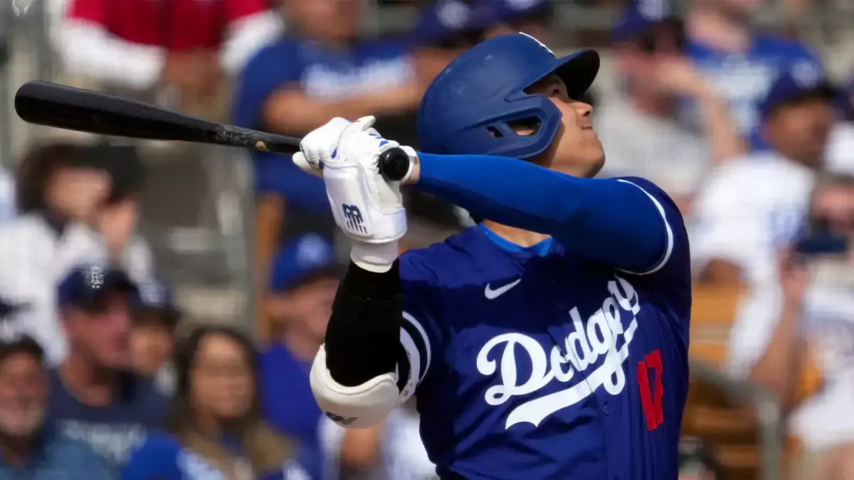 Los Angeles Dodgers designated hitter Shohei Ohtani (17) hits a two run home run during the fifth inning against the Chicago White Sox at Camelback Ranch-Glendale.