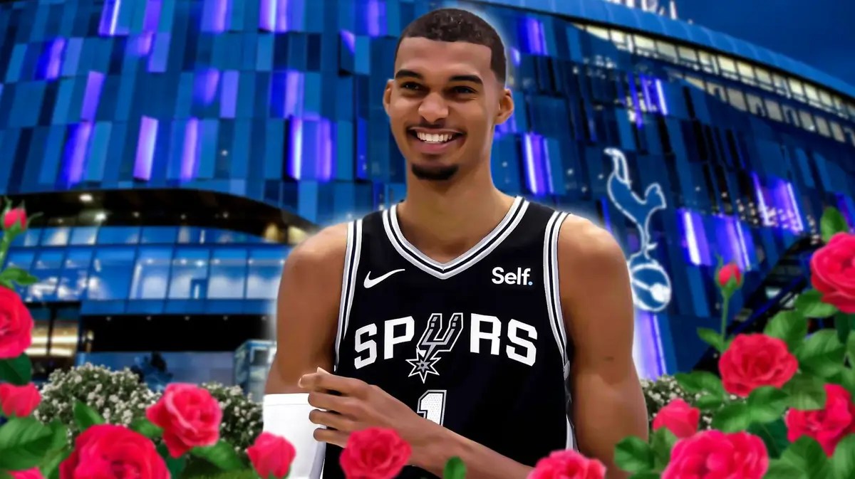 Spurs' Victor Wembanyama smiling, with plenty of flowers growing around him