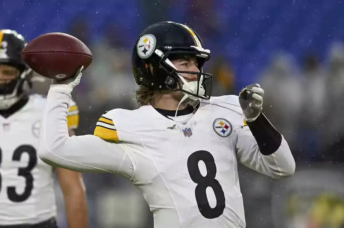 Pittsburgh Steelers quarterback Kenny Pickett (8) warms up before the game against the Baltimore Ravens at M&T Bank Stadium.