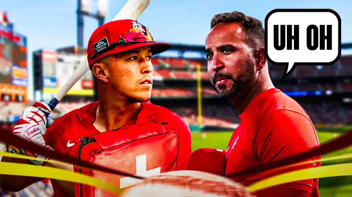 Tommy Edman on one side with an injury kit in front of him, Oliver Marmol on the other side with a speech bubble that says “Uh oh”