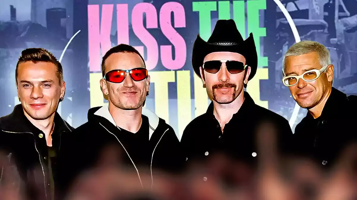 U2 Larry Mullen Jr., Bono, The Edge, and Adam Clayton with Kiss the Future documentary poster.