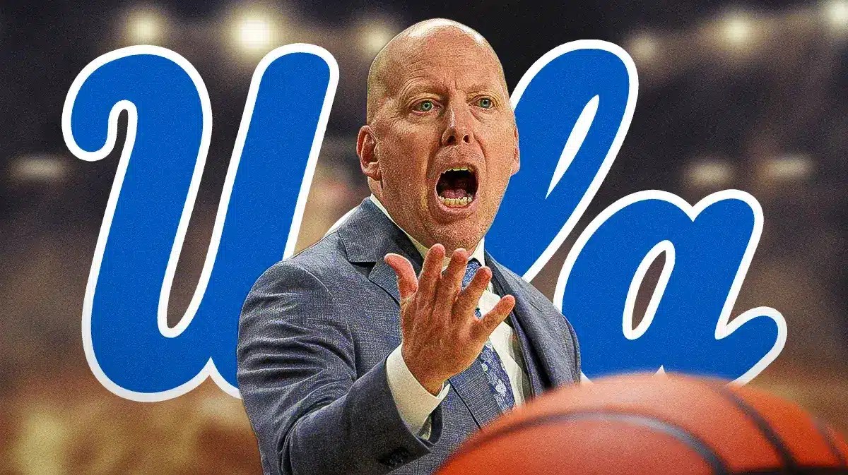 Photo: Mick Cronin with suit and UCLA logo behind him