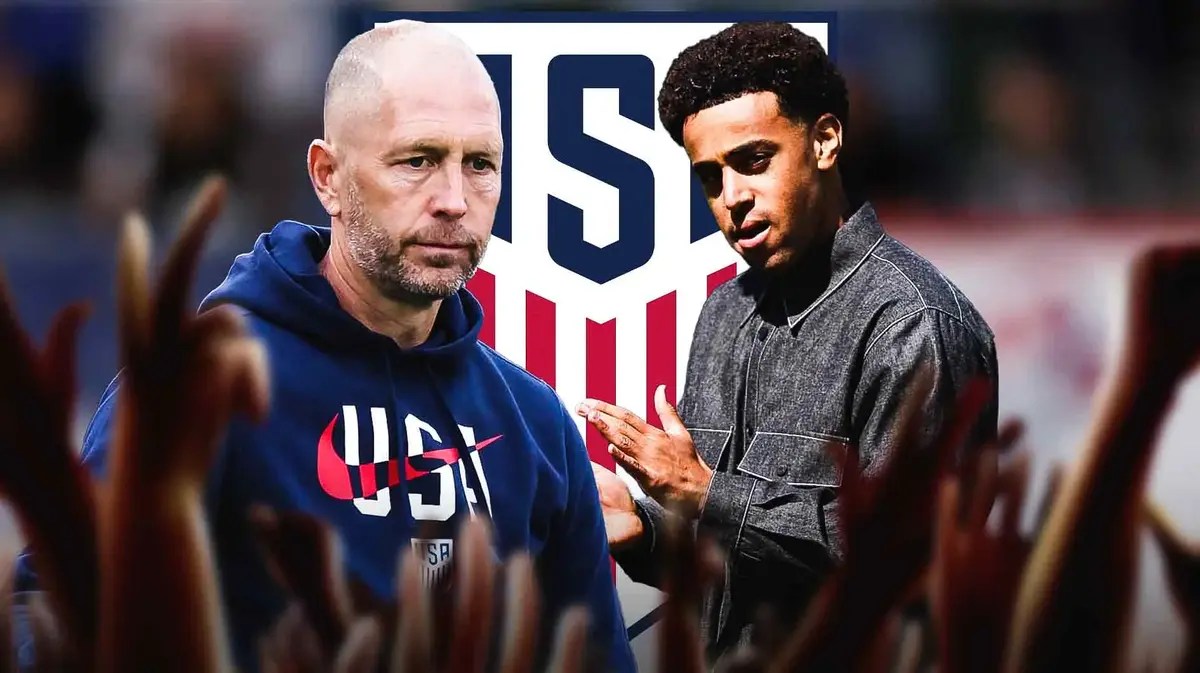 Gregg Berhalter and Tyler Adams in front of the USMNT logo