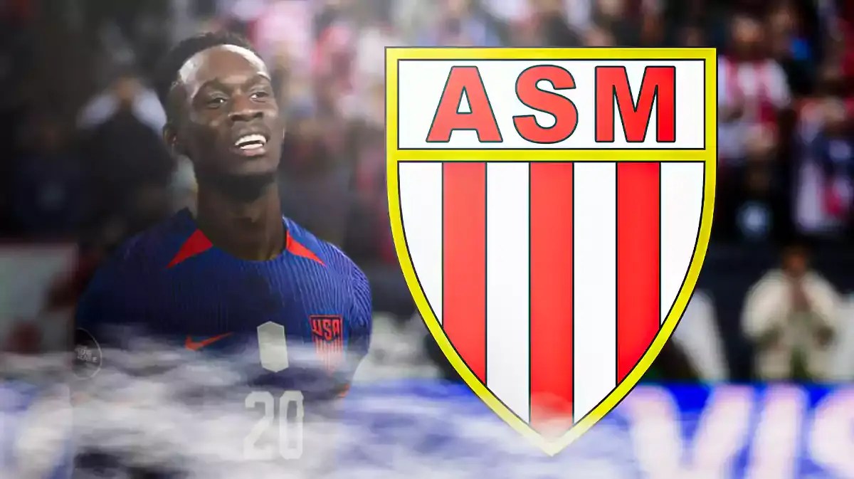 Folarin Balogun looking sad in front of the AS Monaco logo