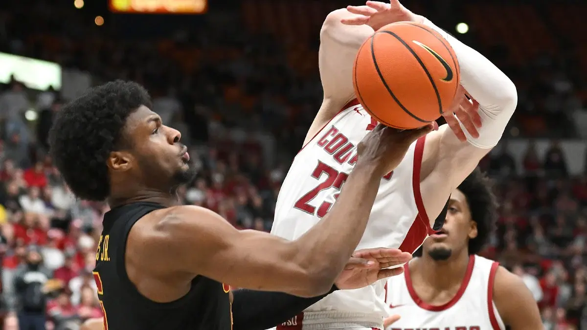 Washington State Cougars forward Andrej Jakimovski (23) is fouled on the shot by USC Trojans guard Bronny James (6) in the first half at Friel Court at Beasley Coliseum.