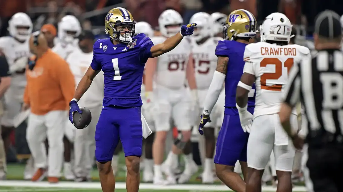 Washington Huskies wide receiver Rome Odunze (1) celebrates after a play during the second quarter against the Texas Longhorns in the 2024 Sugar Bowl college football playoff semifinal game at Caesars Superdome. 