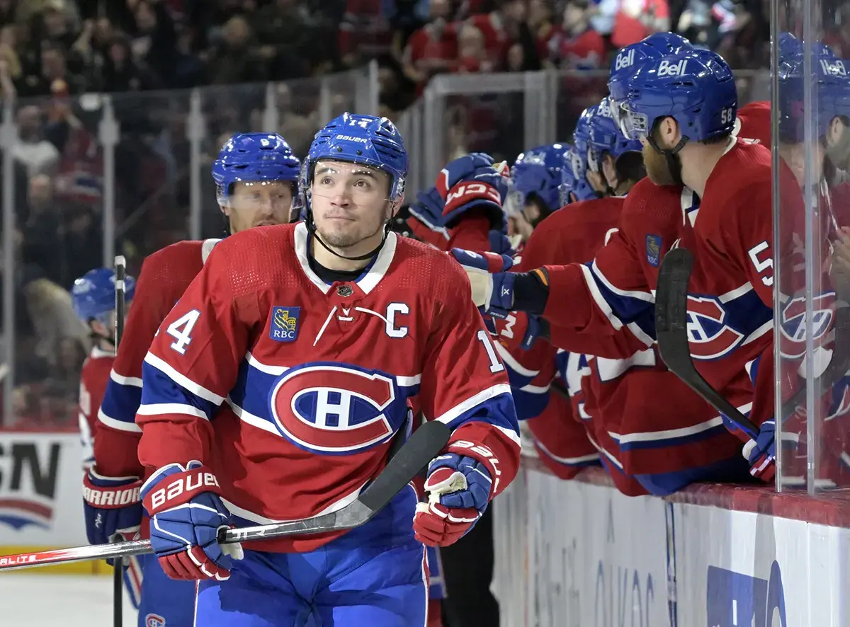 Montreal Canadiens forward Nick Suzuki (14) celebrates with teammates after scoring a goal against the Washington Capitals during the third period at the Bell Centre NHL Power Rankings