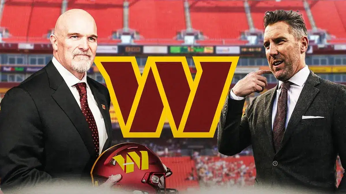 Commanders Dan Quinn and Adam Peters next to a Commanders logo at FedEx Field