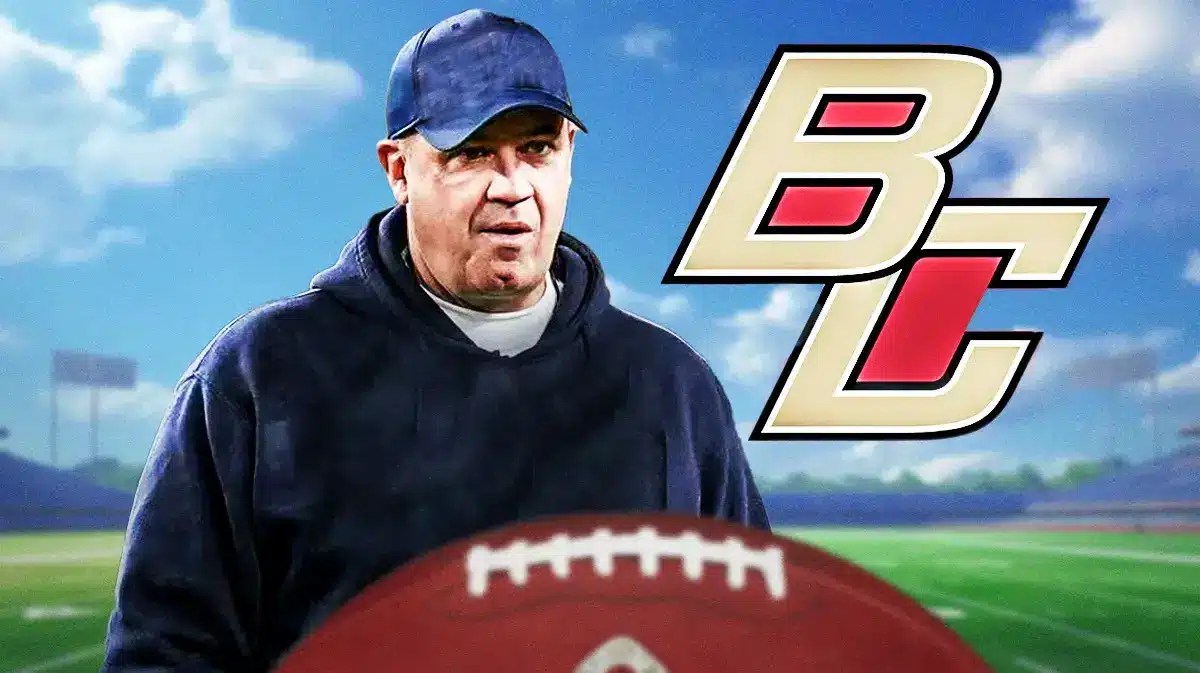 Bill O'Brien looking at a Boston College logo.