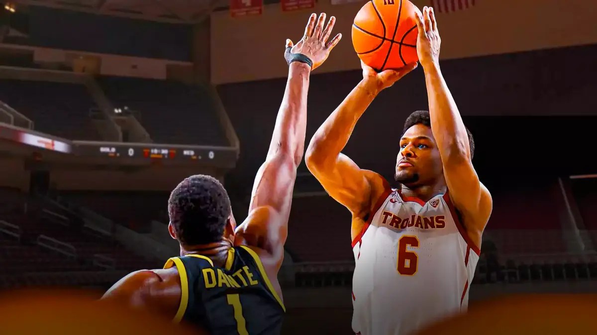 USC basketball Bronny James shoots over Oregon center N'Faly Dante