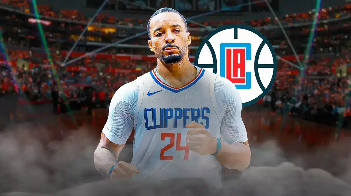 Normal Powell grimaces while Clippers' Paul George and Pistons' Jalen Duren look from the background