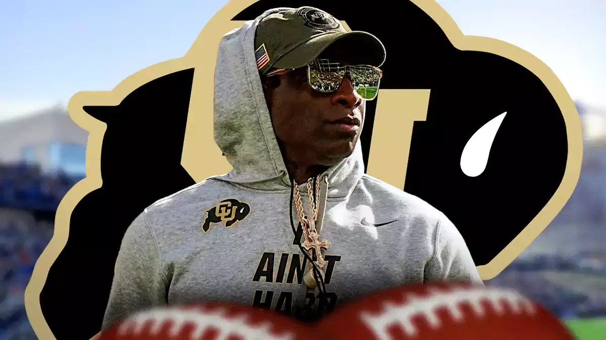Photo: Deion Sanders in Colorado gear with Colorado logo behind him