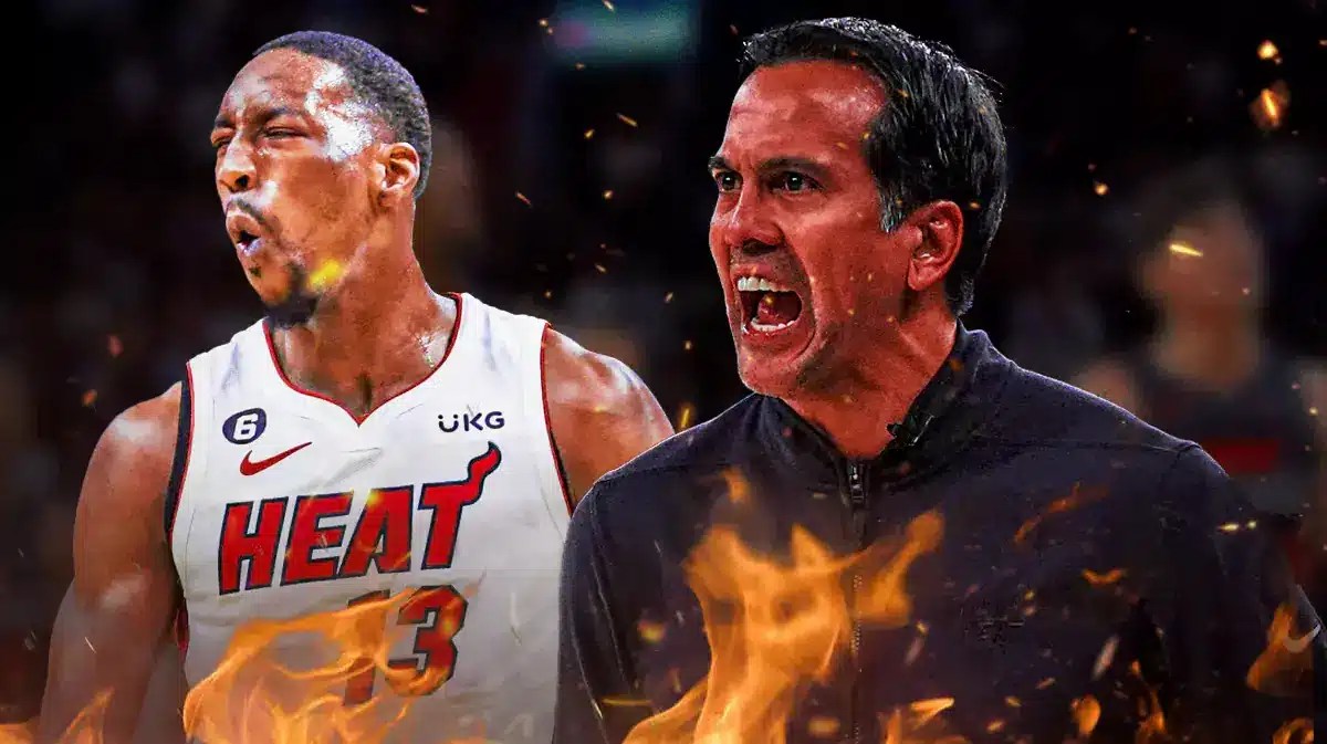 Miami Heat head coach Erik Spoelstra next to star Bam Adebayo in front of the Kaseya Center.