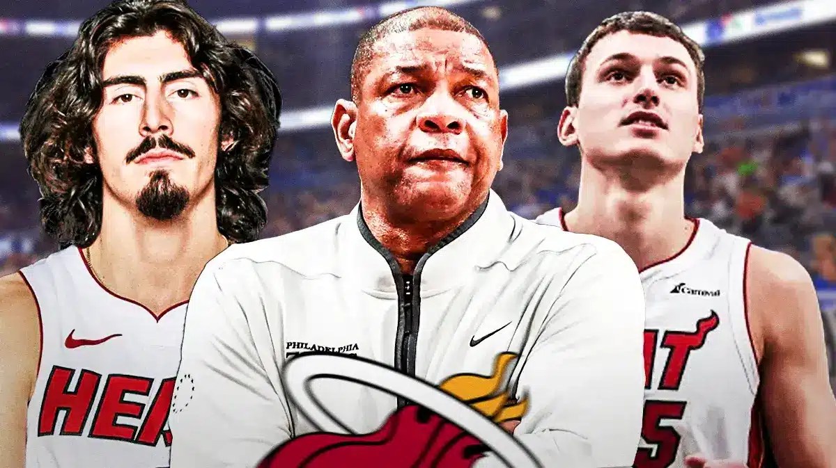 Miami Heat stars Jaime Jaquez Jr. and Nikola Jovic next to Milwaukee Bucks head coach Doc Rivers in front of the Kaseya Center.