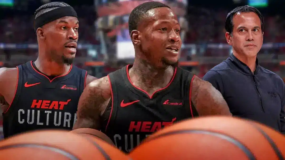 Miami Heat stars Terry Rozier, Jimmy Butler, and head coach Erik Spoelstra in front of the Kaseya Center.