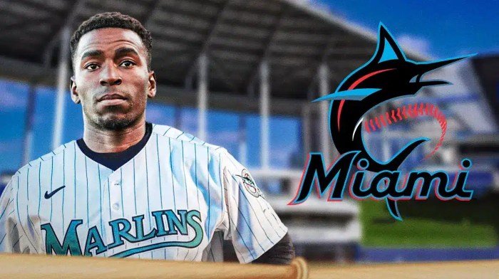 Nick Gordon wearing a Marlins jersey next to a Marlins logo at loanDepot Park