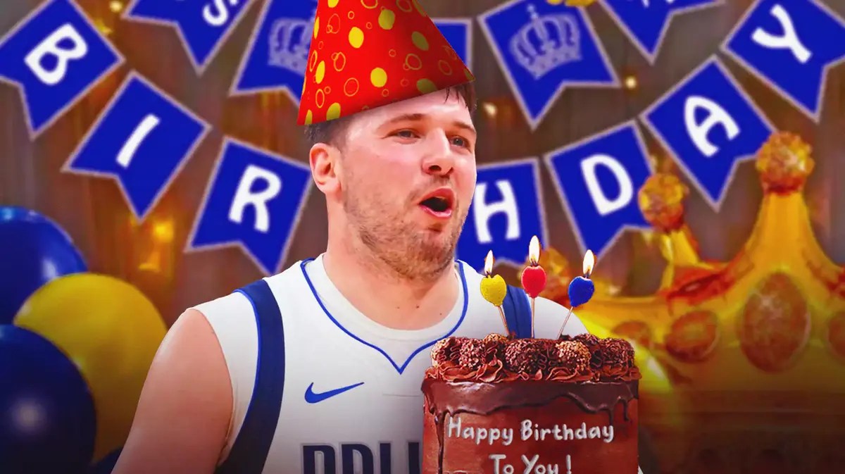 Mavericks Luka Doncic wearing a birthday hat and blowing out candles