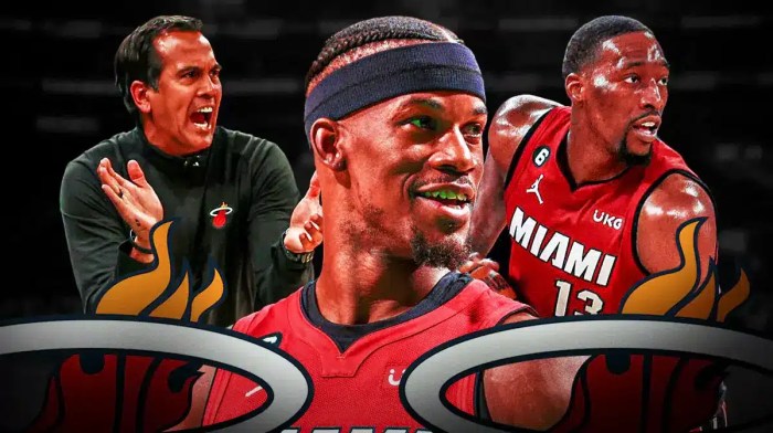 Miami Heat stars Jimmy Butler and Bam Adebayo next to head coach Erik Spoelstra in front of the Kaseya Center.