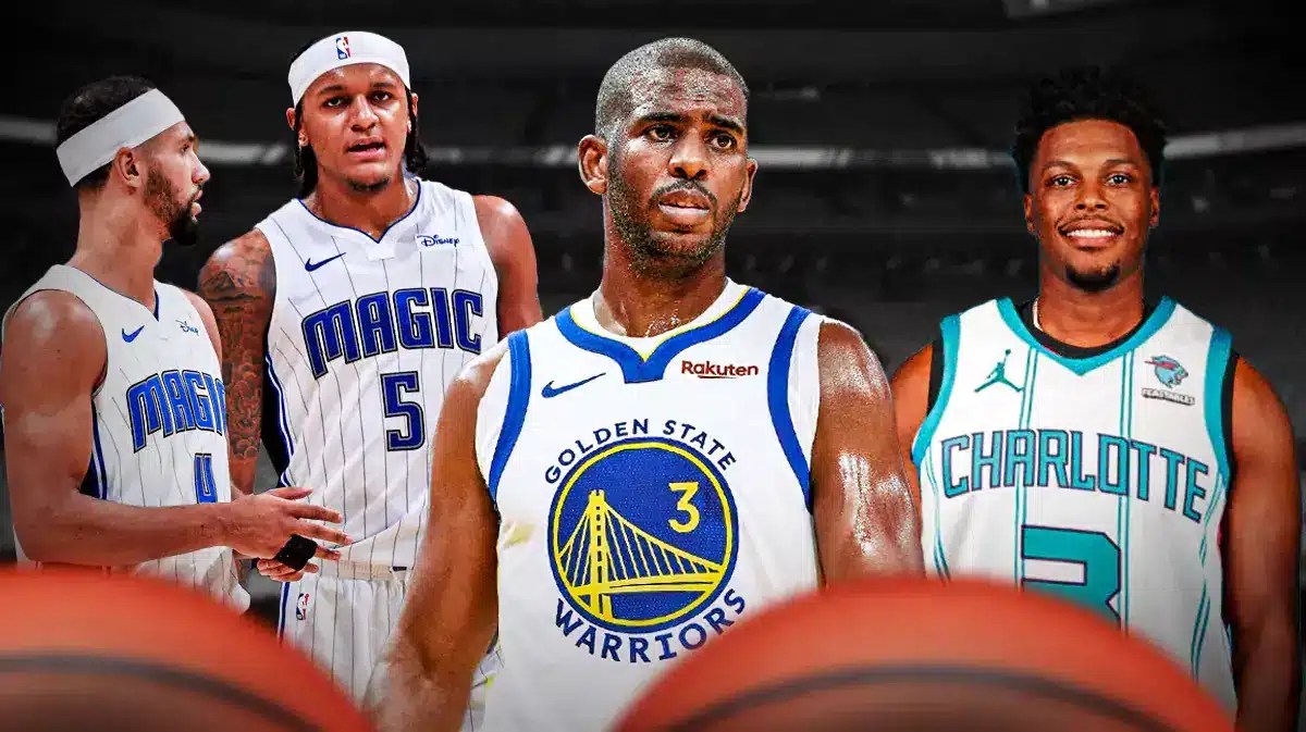 Magic players Paolo Banchero and Jalen Suggs looking at Chris Paul and Kyle Lowry.