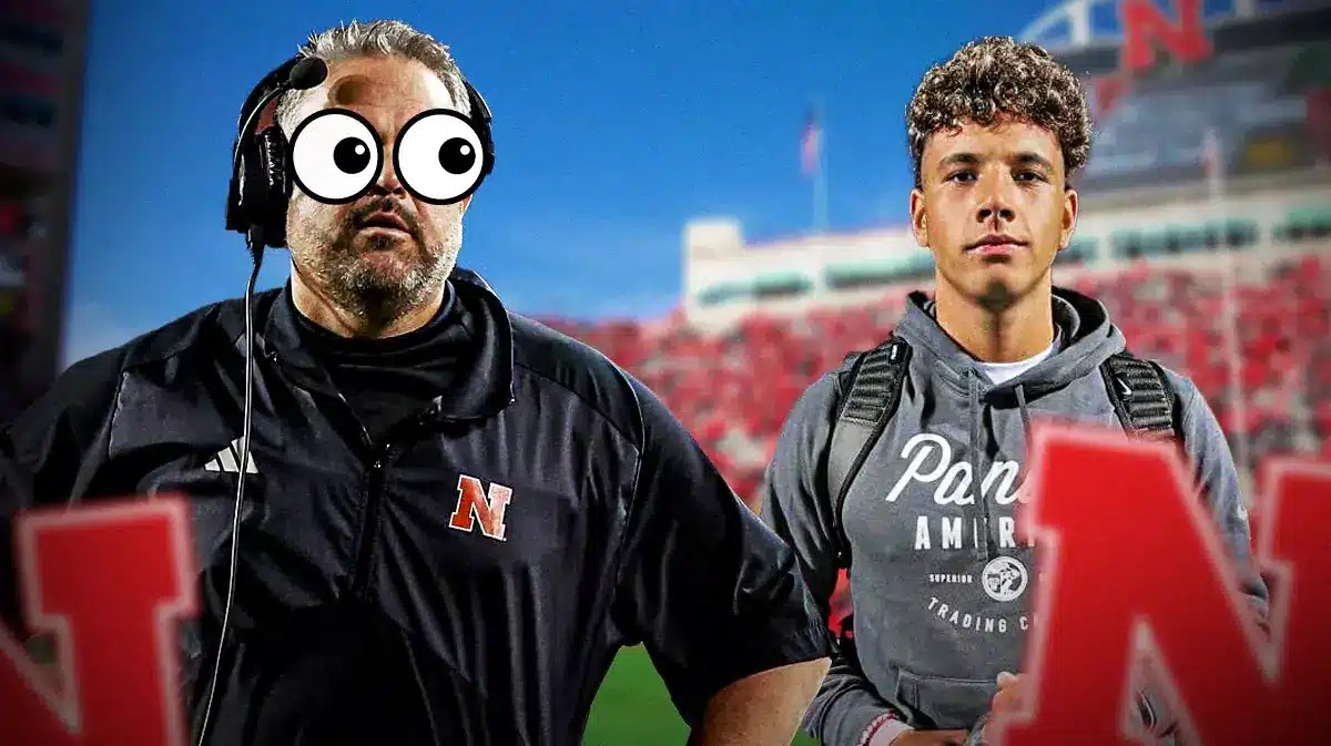 Nebraska coach Matt Rhule loooking at Dylan Raiola.