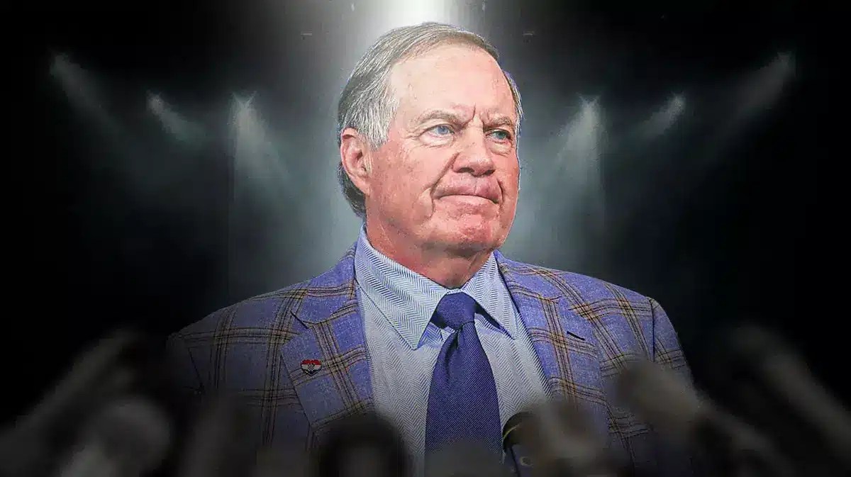 Former Patriots head coach Bill Belichick with spotlight on him
